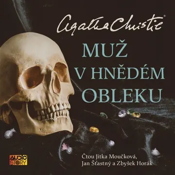 Muž v hnědém obleku